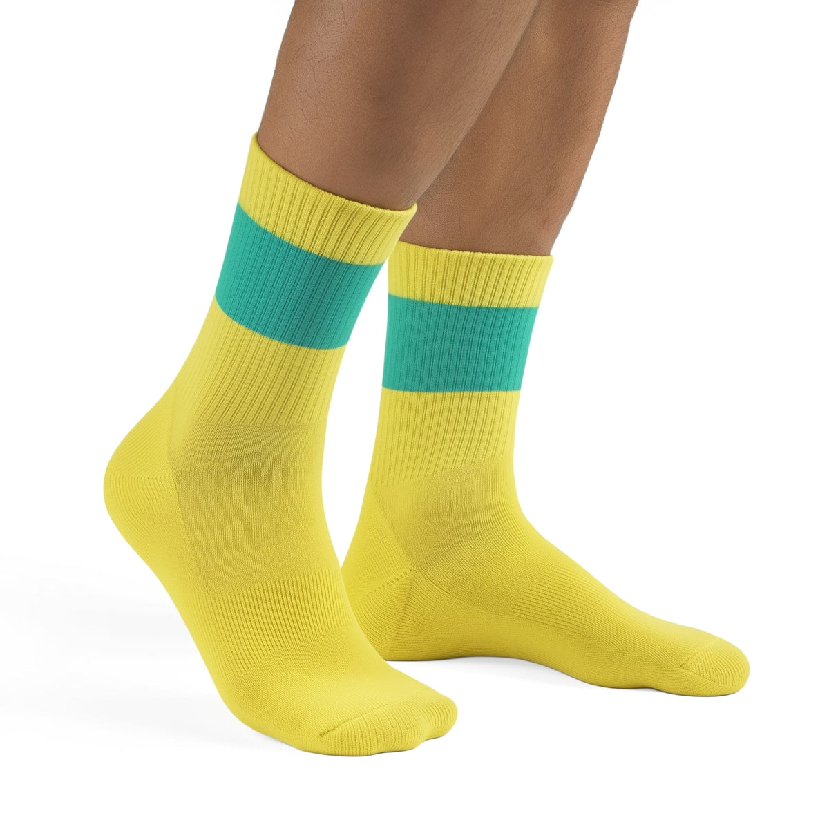 Yellow socks with green stripes worn by a person on a white background (Green)
