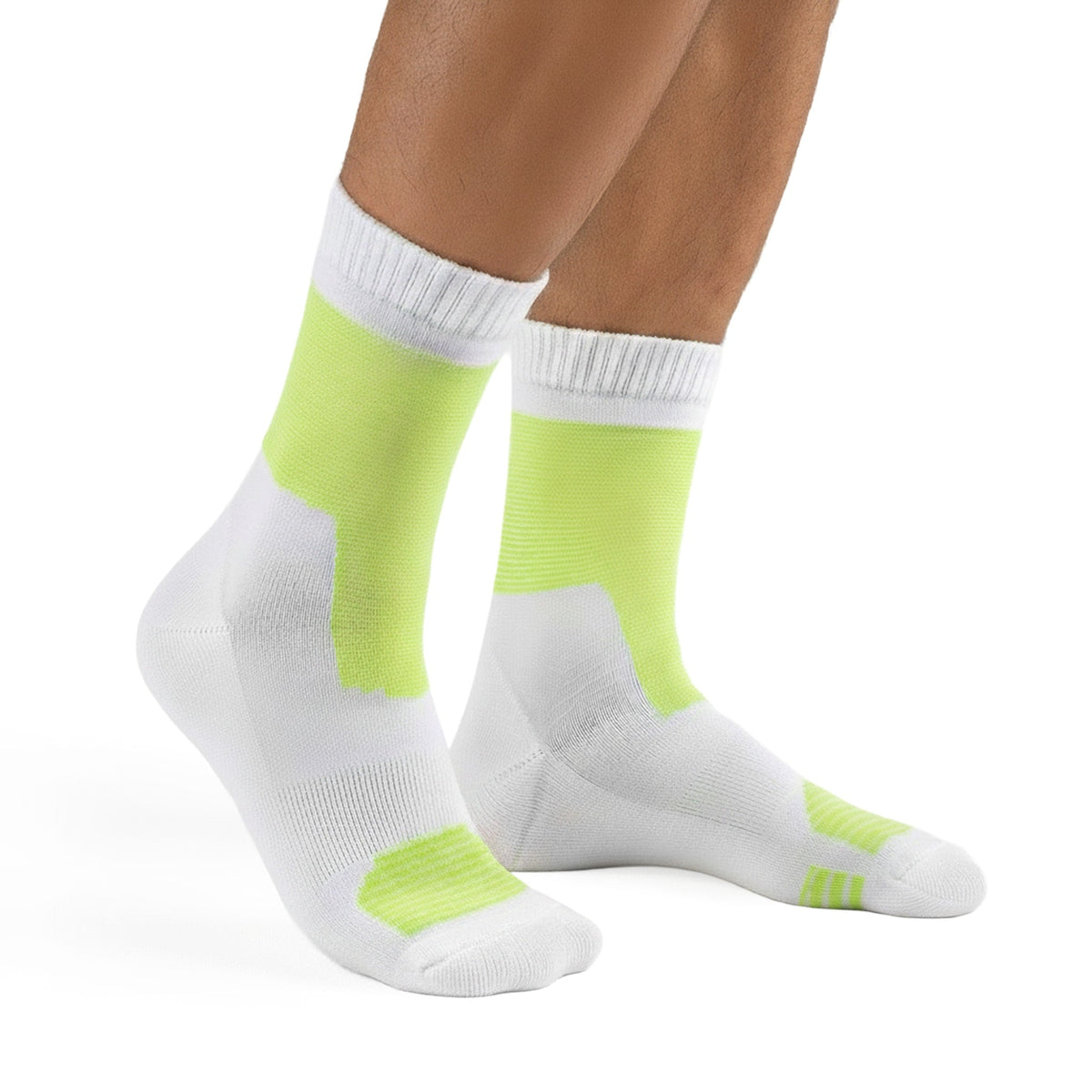 White socks with neon green accents worn by a person on a white background (Green)