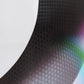 Close-up of black textured fabric on a white background (white)