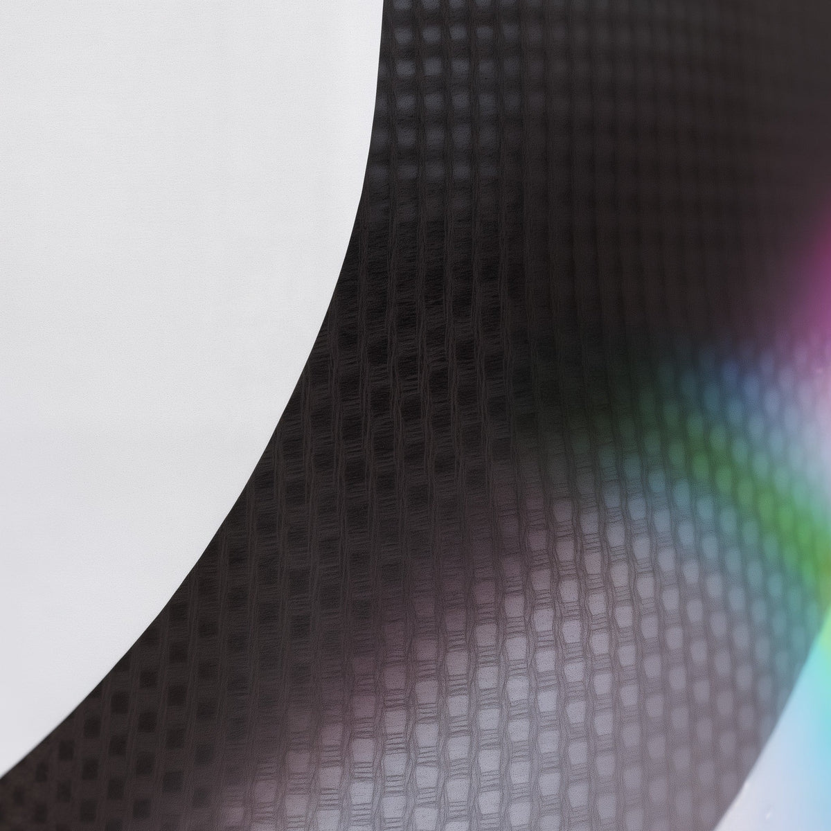 Close-up of black textured fabric on a white background (white)
