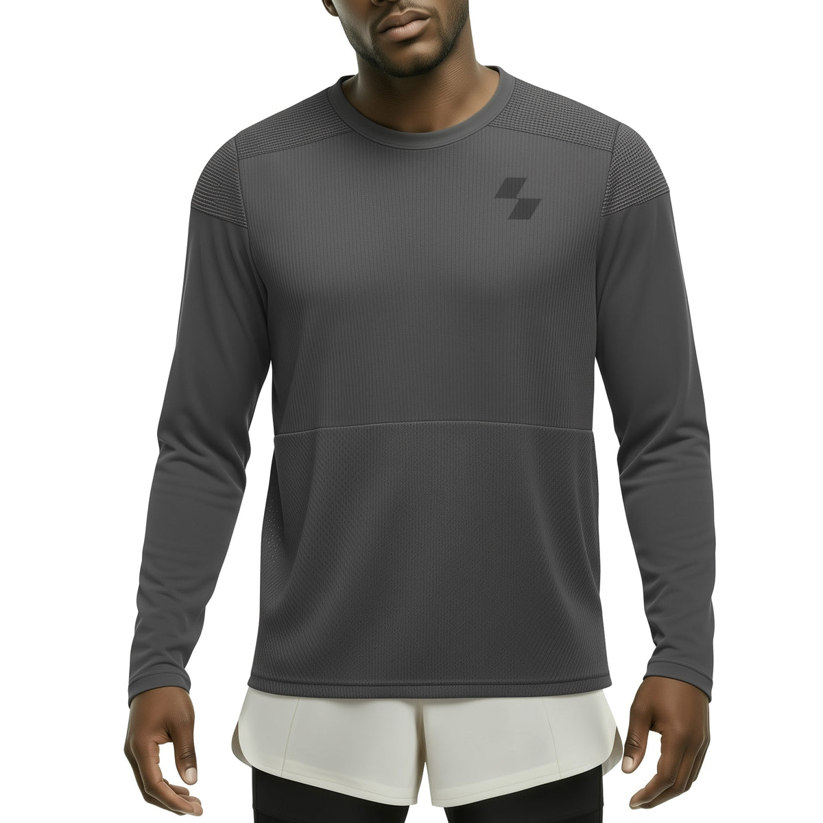Man wearing a gray long-sleeve athletic shirt with a logo on a white background (Black)