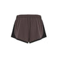 Brown athletic shorts with black accents on a white background (Brown)