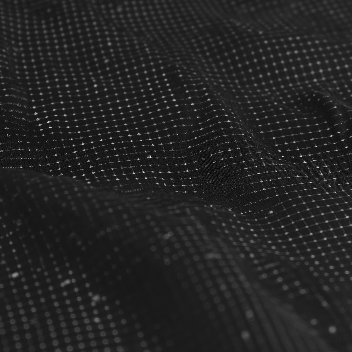 Close-up of black textured fabric (Black)