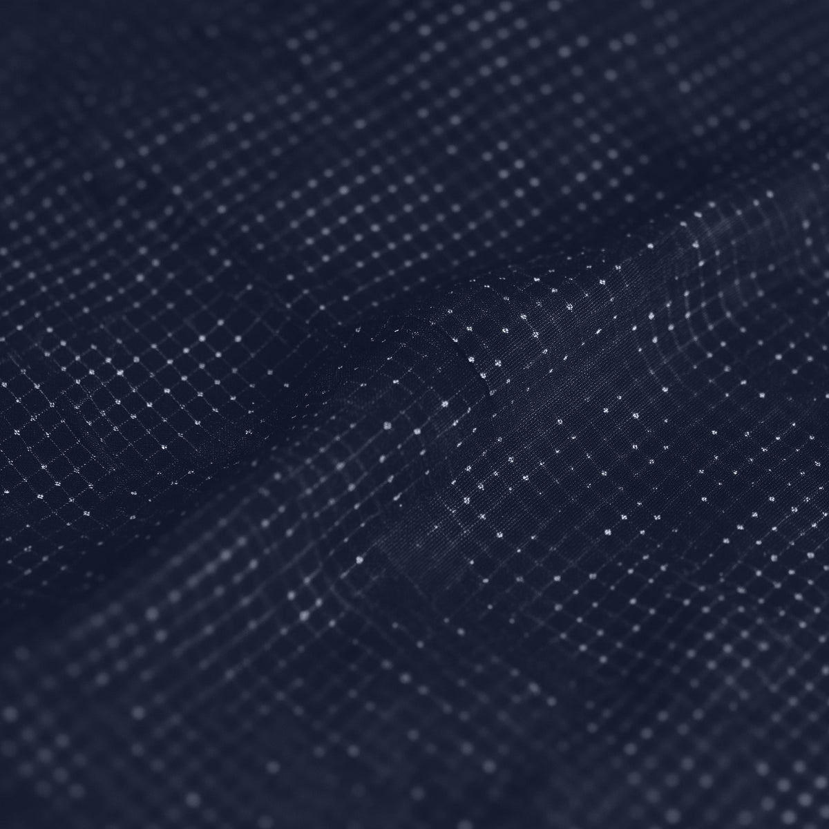 Close-up of a dark blue fabric texture with a subtle pattern (Blue)