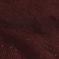 Close-up of a textured brown fabric surface (Red)