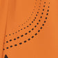 Close-up of an orange fabric with black geometric pattern (Orange)