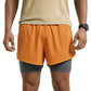 Person wearing a beige top and two-tone shorts on a white background (Orange)